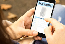a person on a dental insurance phone app