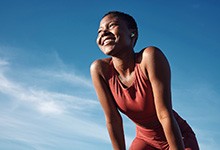 Lady smiles outdoors