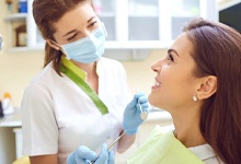 Implant dentist in San Antonio speaking with a patient