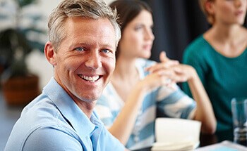 man smiling with dental implants in San Antonio 