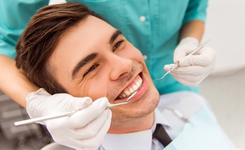 Smiling man in dental exam room