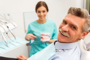 Man at initial consultation for dental implants in San Antonio