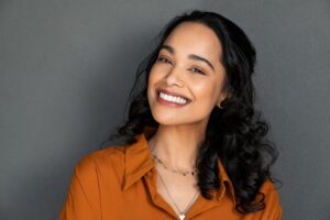 Young woman smiling.
